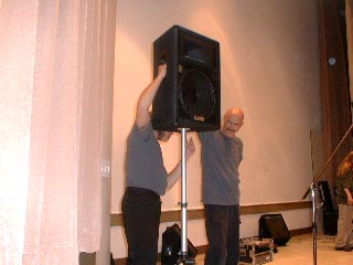 Tony and Richard are lifting the house speakers in this photo.