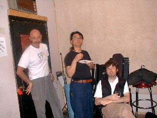 Tony, Hideyo, and Paul having a little snack backstage.