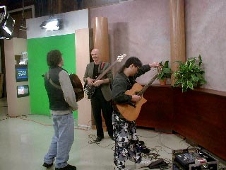 Hideyo, Tony, and Paul setting up for the show